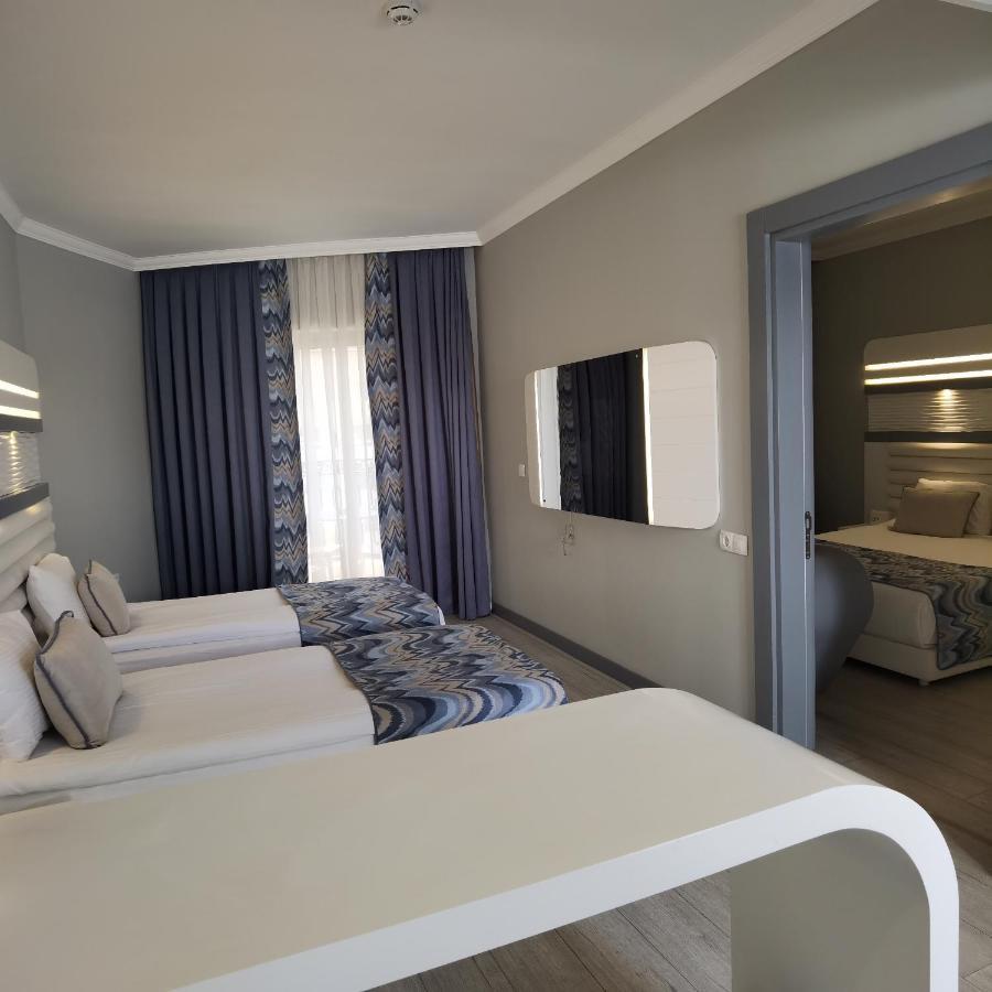 Blue Marlin Deluxe Spa & Resort Конаклы Экстерьер фото A room at the hotel